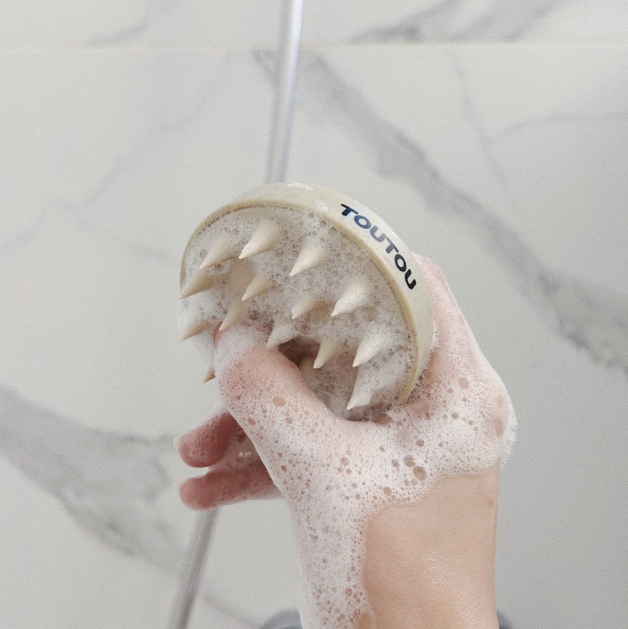 brosse de douche chien